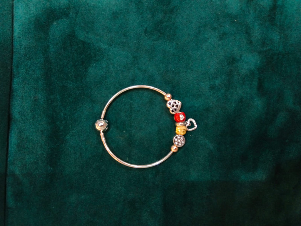 925 silver rose gold charm bangle with heart and enamel beads on teal velvet