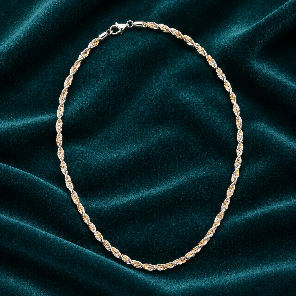 925 silver dual tone rope chain flat lay on teal velvet