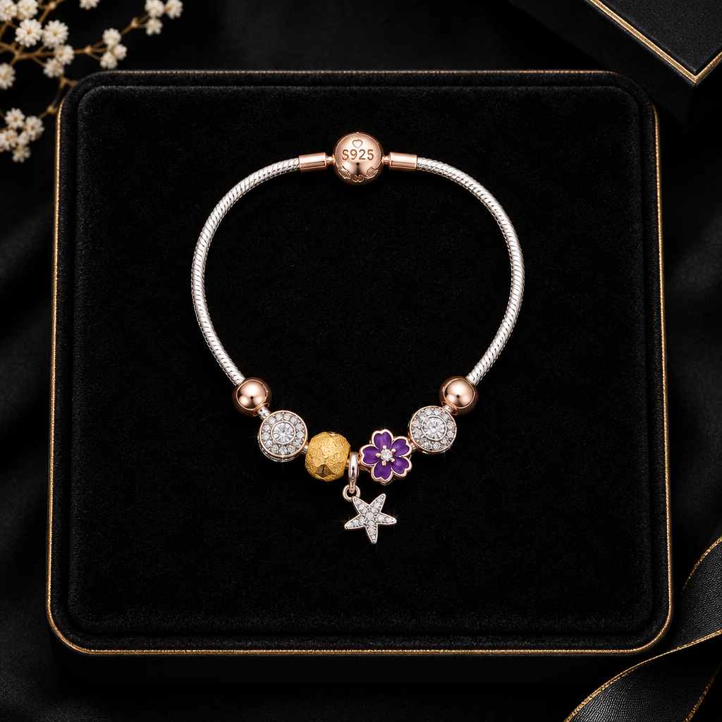 925 silver rose gold charm bracelet on black velvet tray
