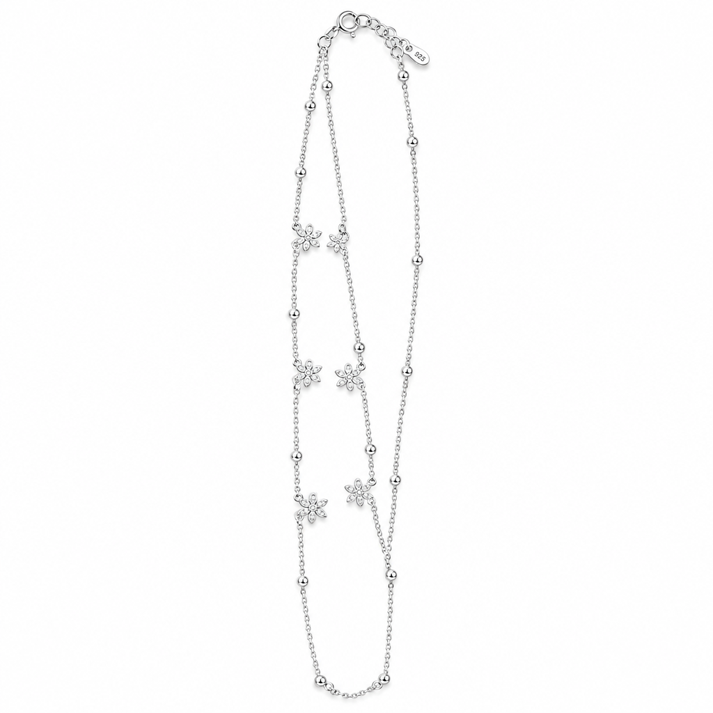 925 silver snowflake charm anklet on white background