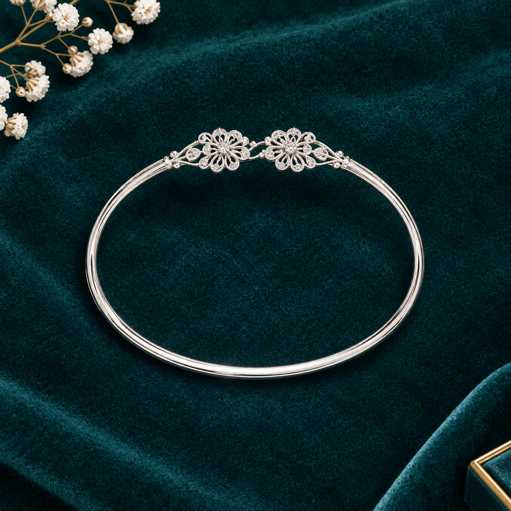925 Italian silver girls bangle flat lay on teal velvet