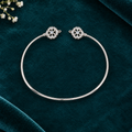 925 Italian silver clover charm kada flat lay on teal velvet