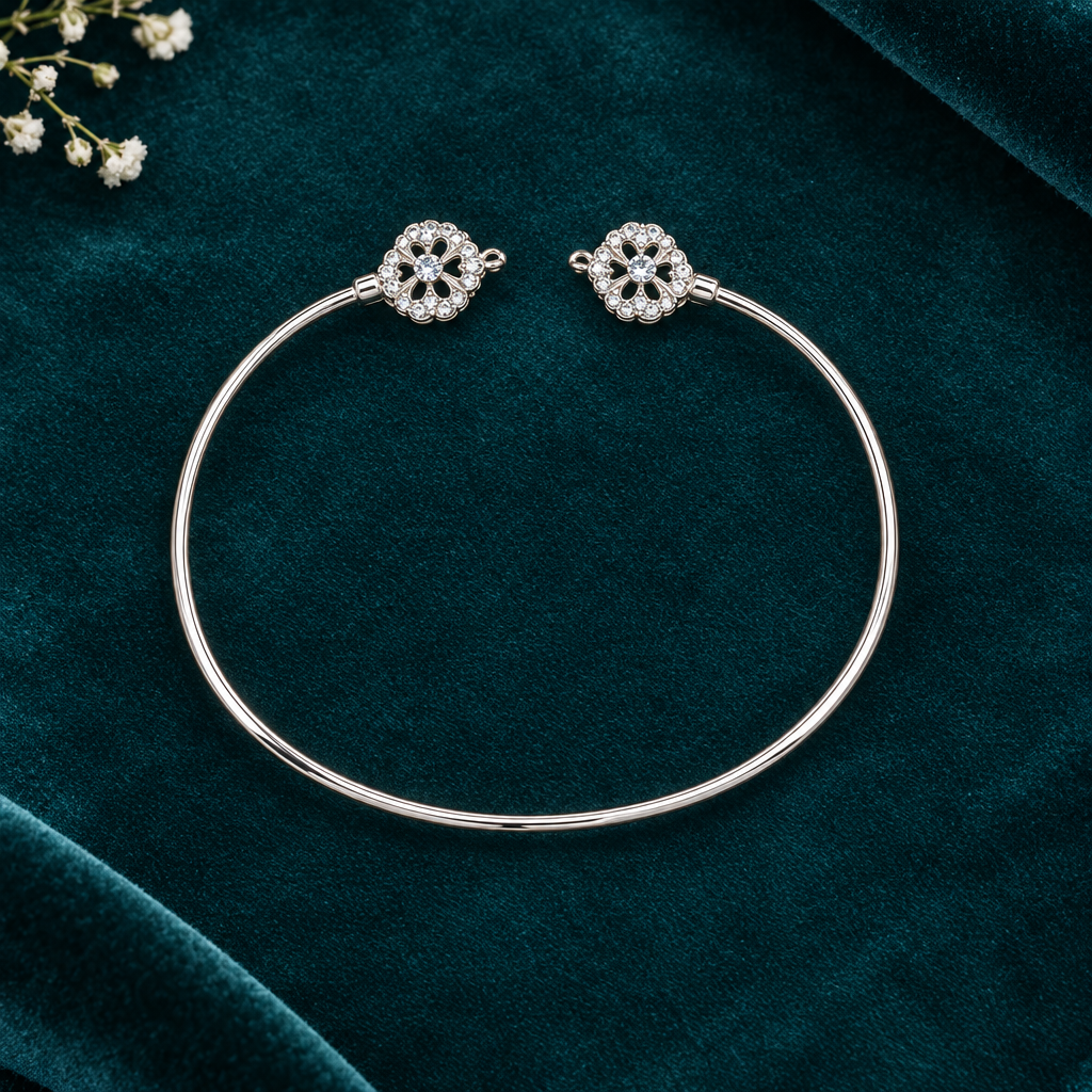 925 Italian silver clover charm kada flat lay on teal velvet