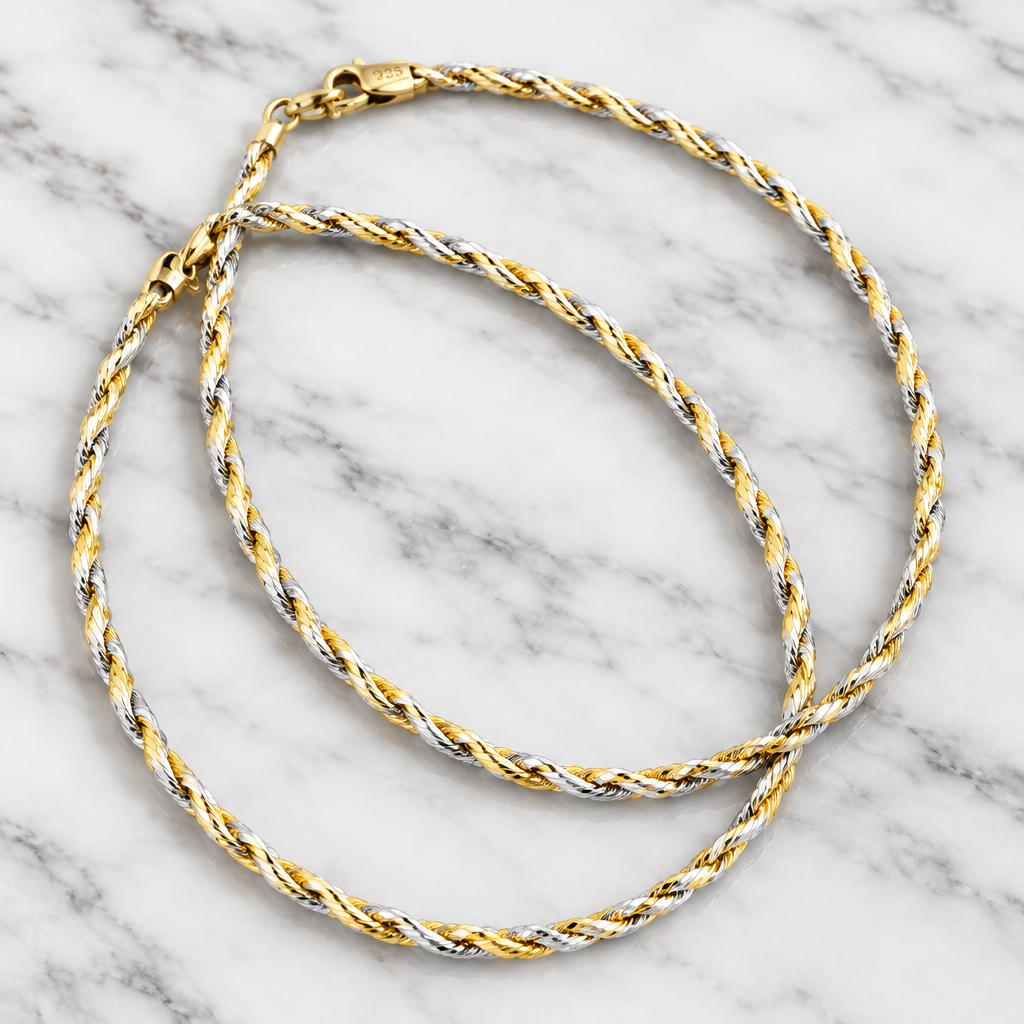 925 silver dual tone rope chain close-up on marble