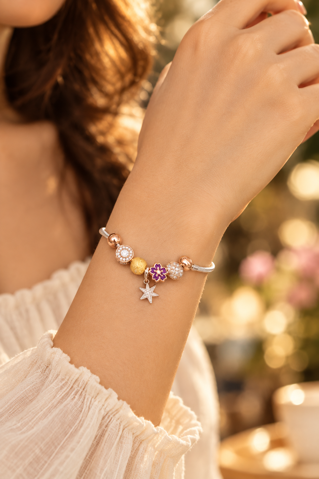 925 silver rose gold charm bracelet worn on wrist
